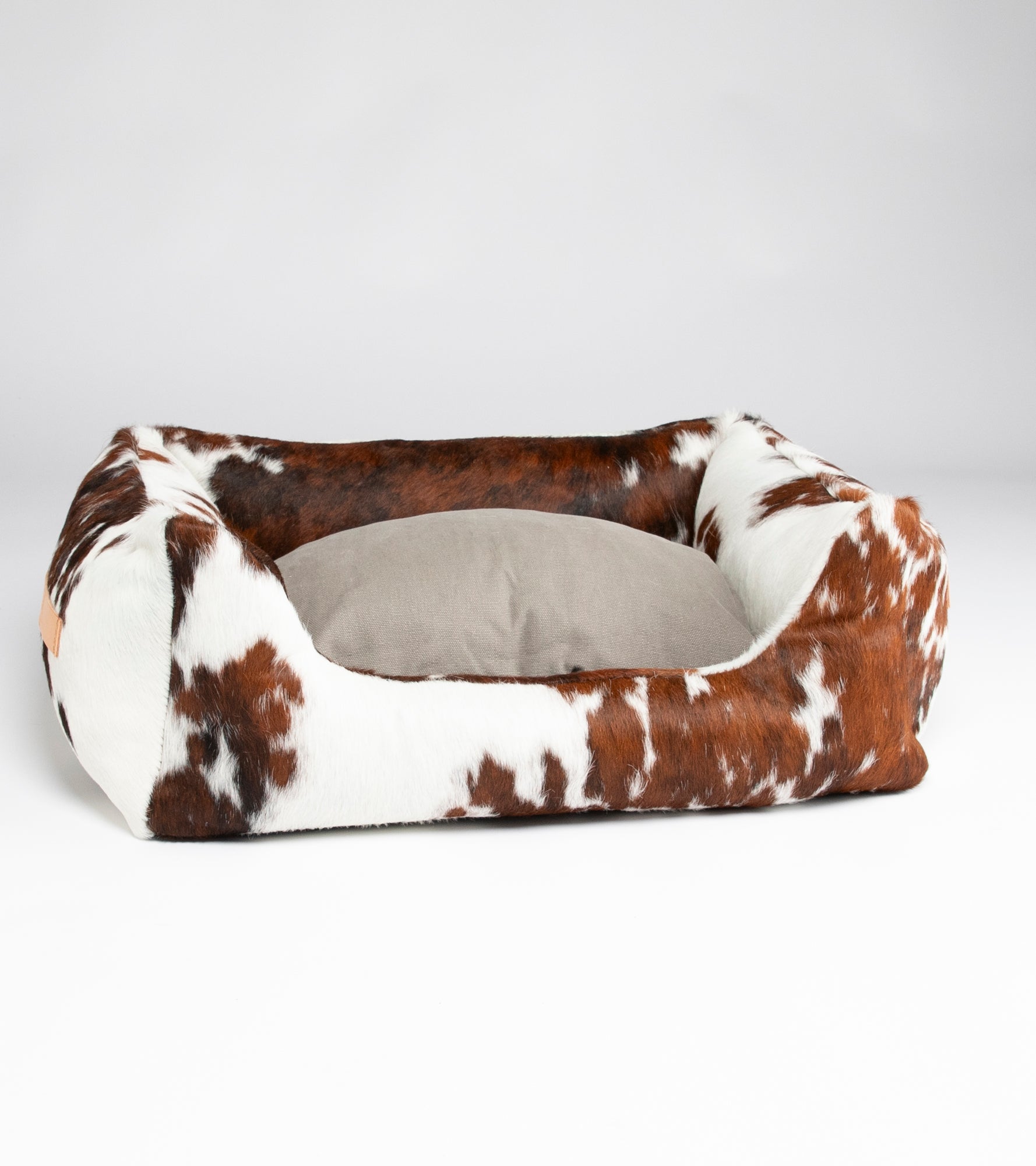 Henri-Cowhide-Leather-Dog-Bed-with-Boucle-Wool-3.jpg